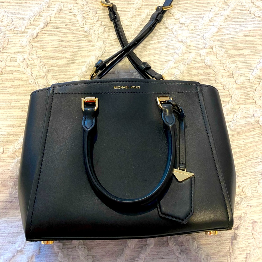 Michael Kors black handbag. Shoulder strap or handles. Black leather with gold